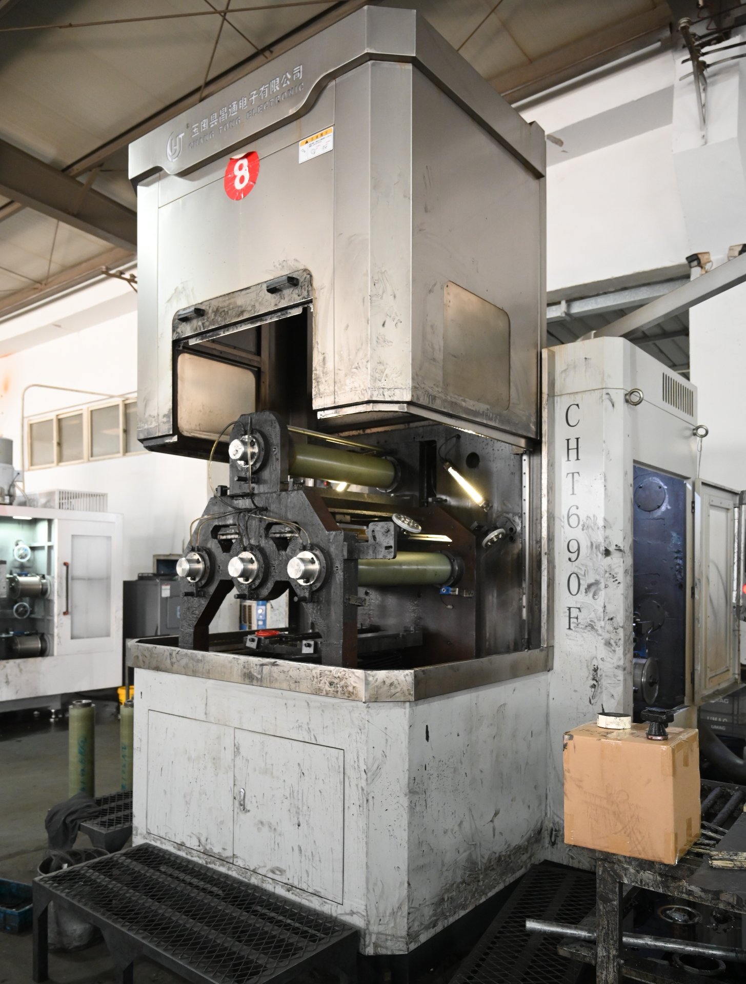 Multi-wire sawing machine cutting a sintered neodymium block