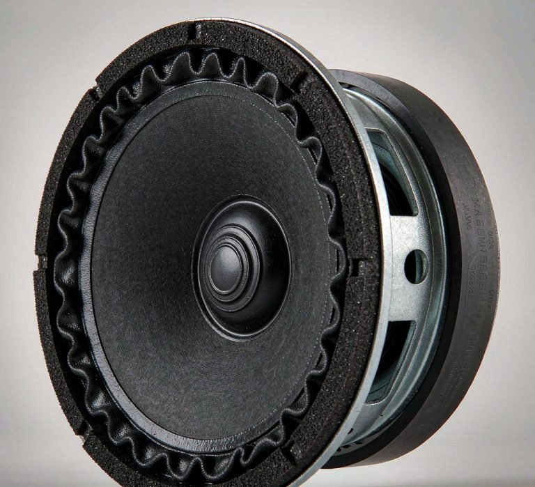 Loudspeaker audio driver that uses a neodymium arc magnet ring